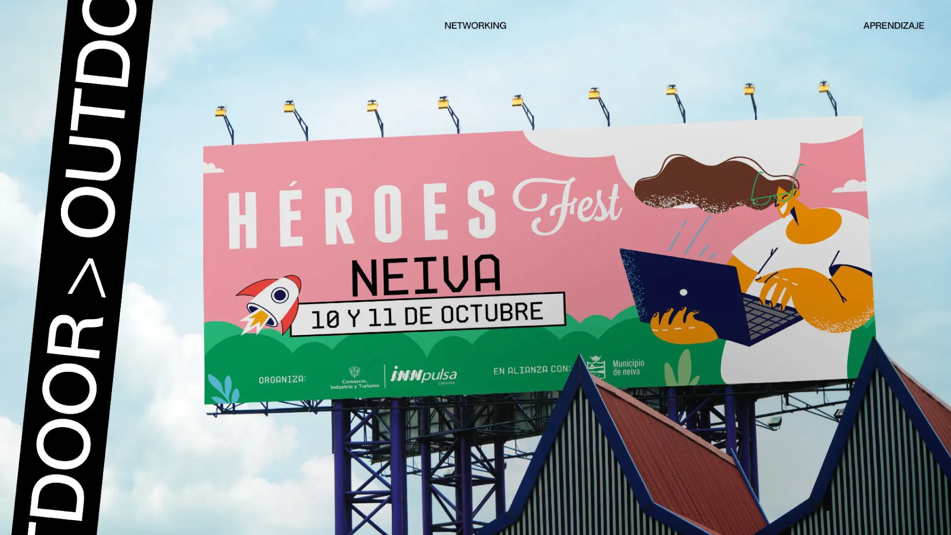 Valla de Héroes Fest en Neiva con la ilustración del festival