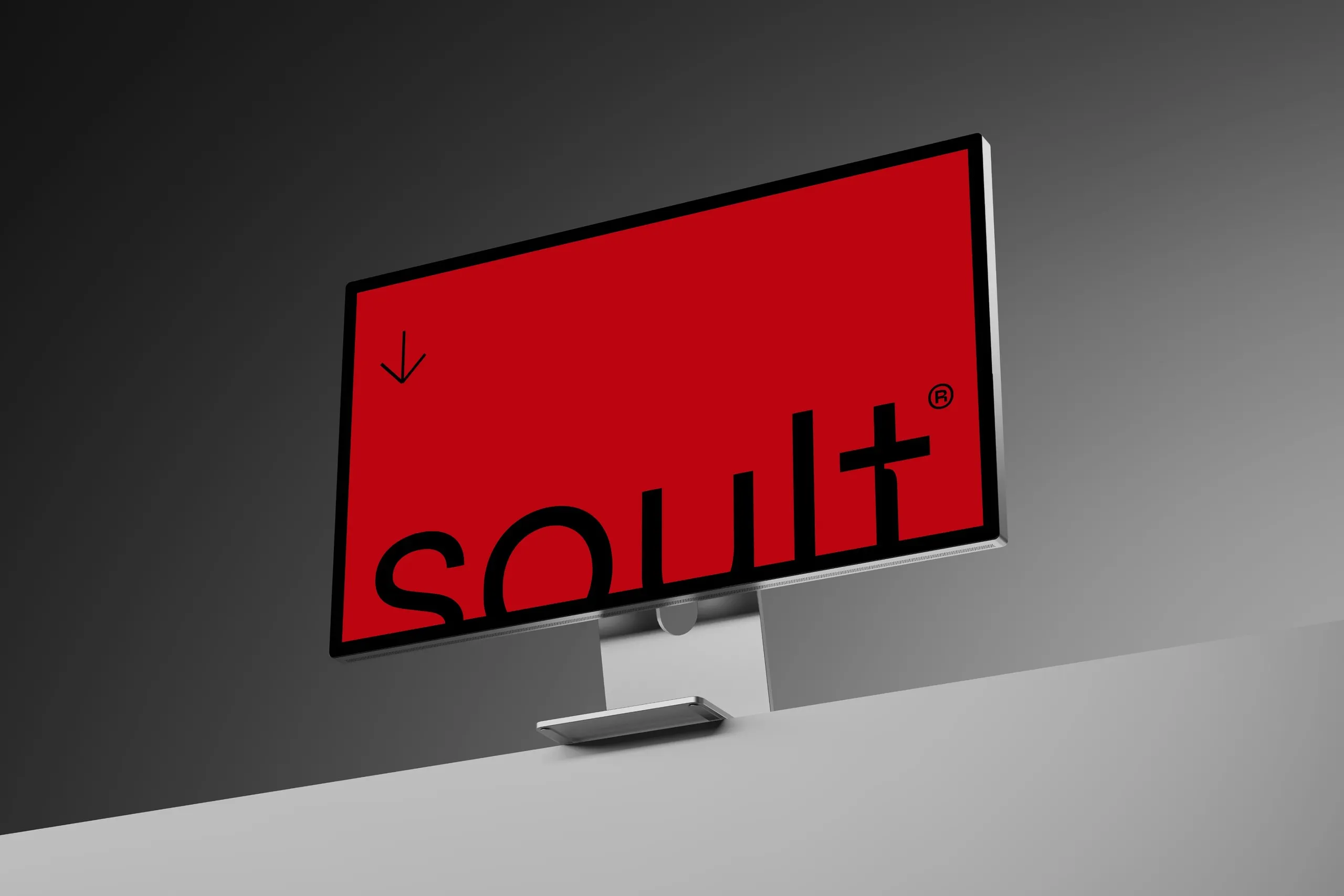 Monitor con el logo de Soult cortado sobre fondo rojo