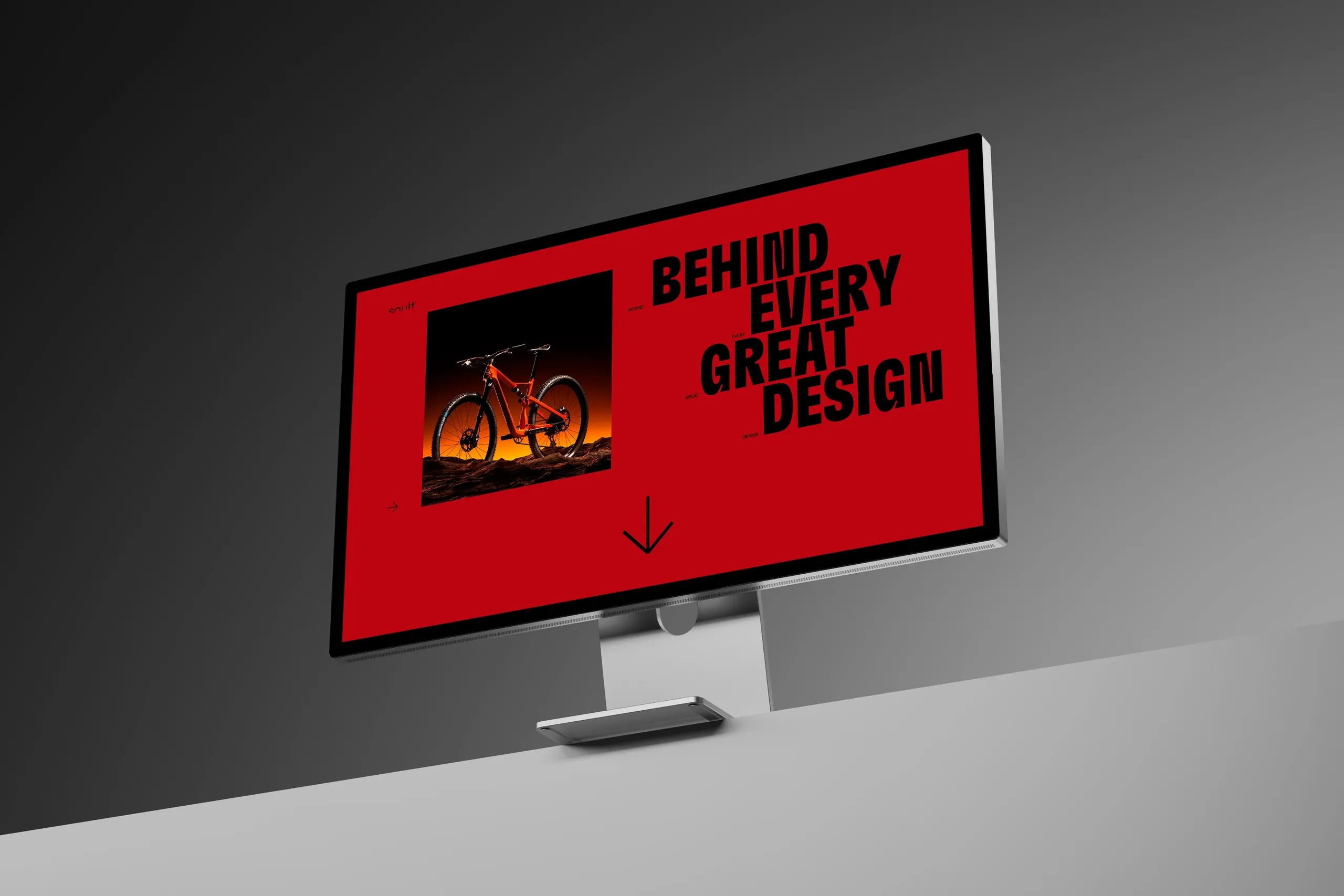 Monitor con la pieza Behind every great design sobre fondo rojo