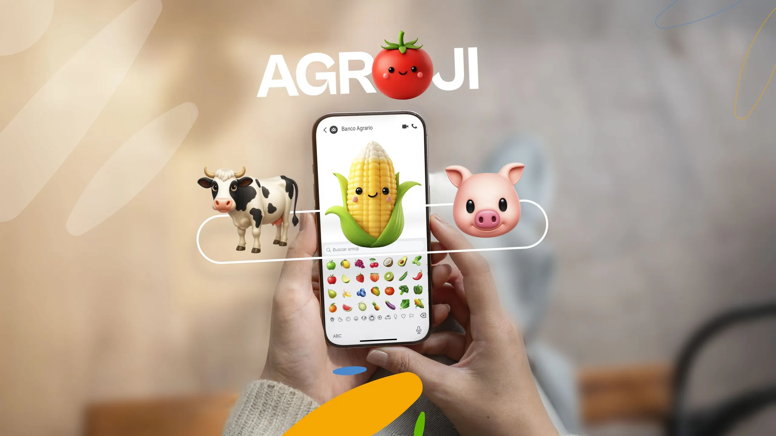 Manos sostienen un celular con el chat de WhatsApp del Banco Agrario y el teclado de emojis abierto, rodeado de emojis de vaca, mazorca y cerdo bajo el logo de AgroJi